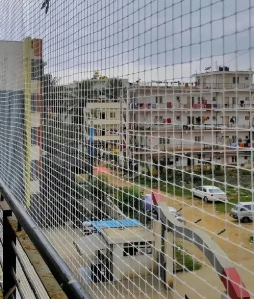 Children safety nets installed on a high-rise balcony in Hyderabad for child protection